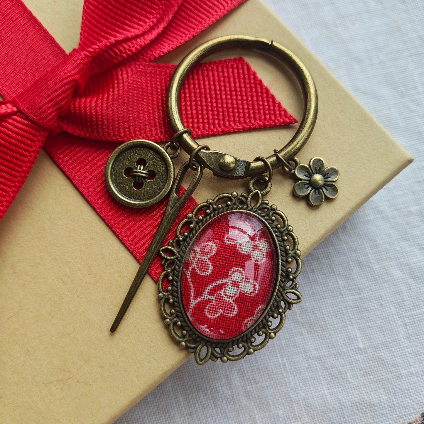 French General Fob with Button & Needle Charm