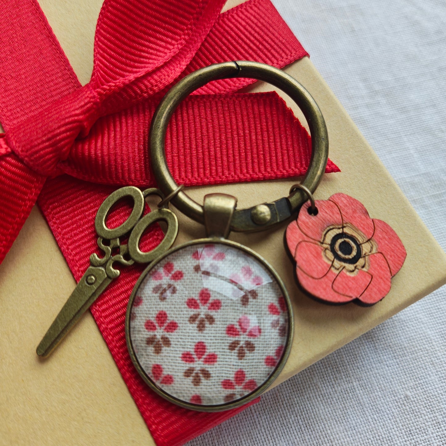 French General Fob with Scissors & Wood Flower Charm